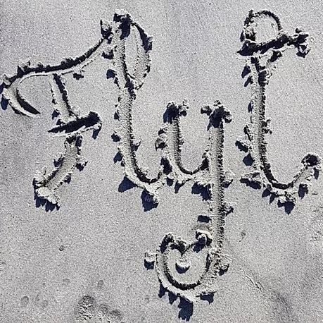 Flyt skrevet i sanden